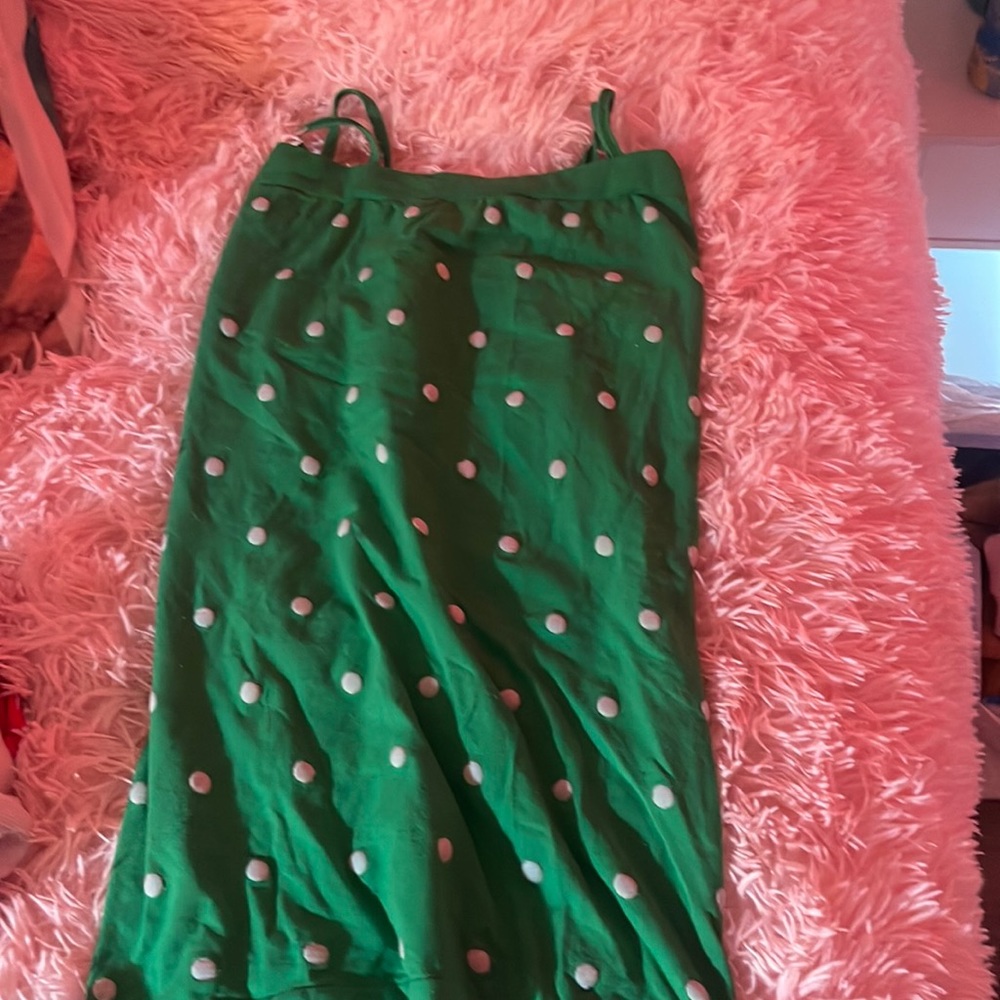 Green and white polka dot tank top